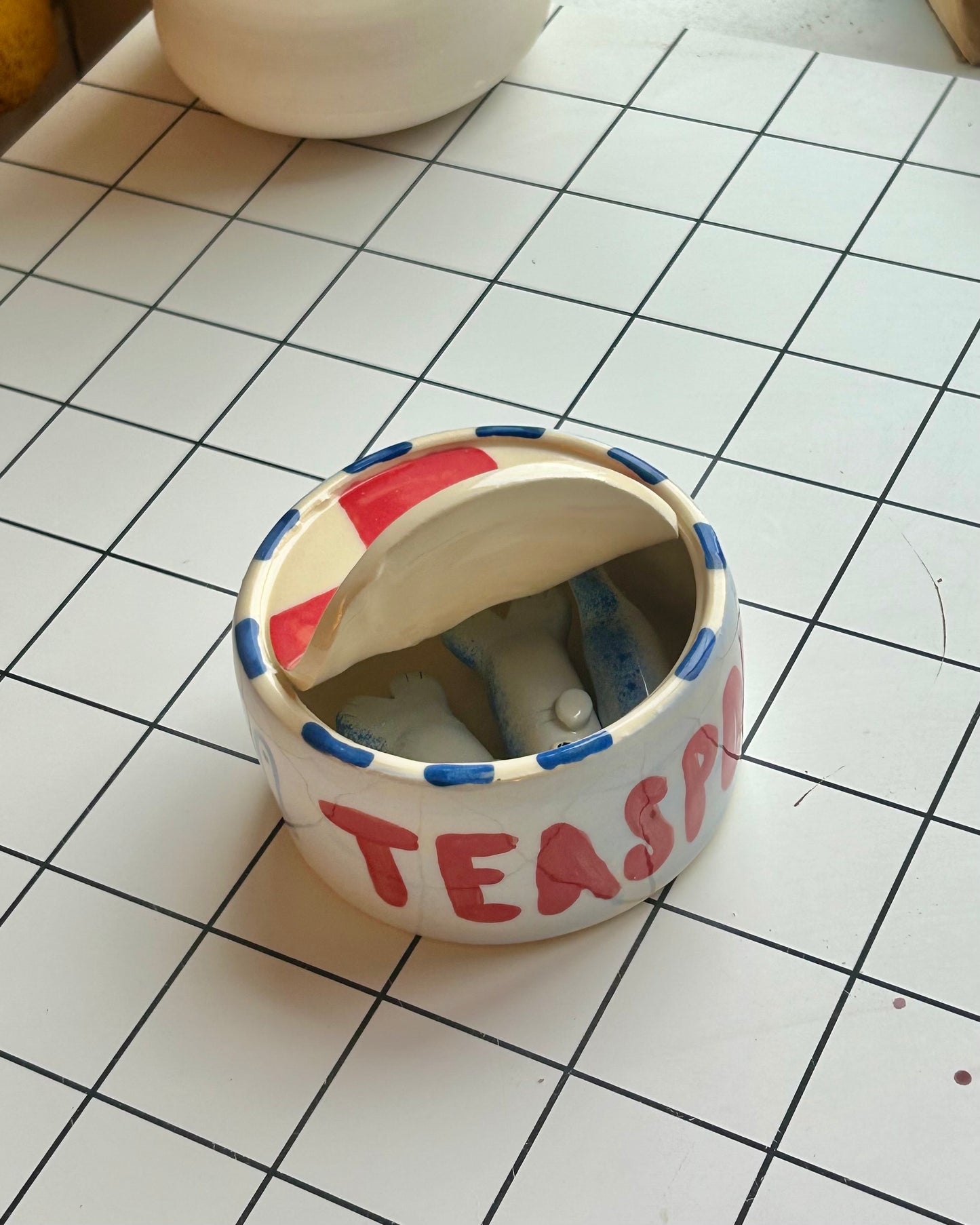 red n’ blue sardine tin + teaspoons