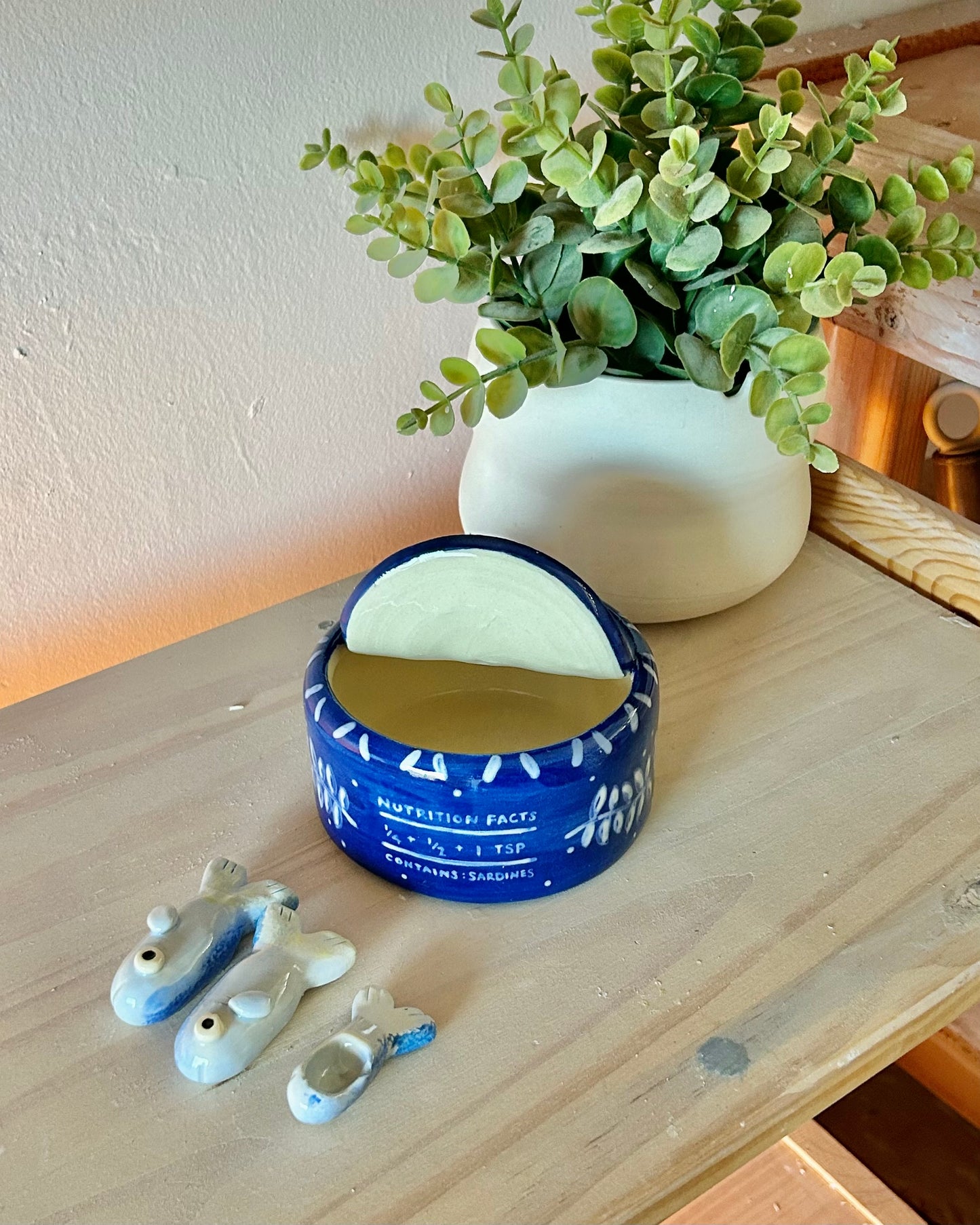 ornate sardine tin + teaspoons