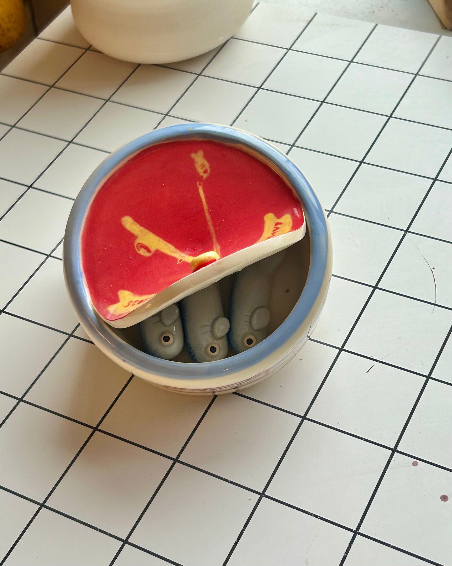 fishing pole sardine tin + teaspoons