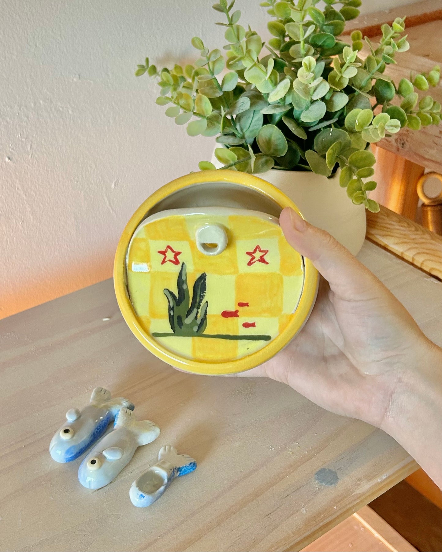 checkered sardine tin + teaspoons