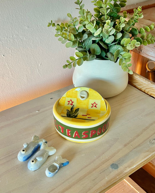 checkered sardine tin + teaspoons