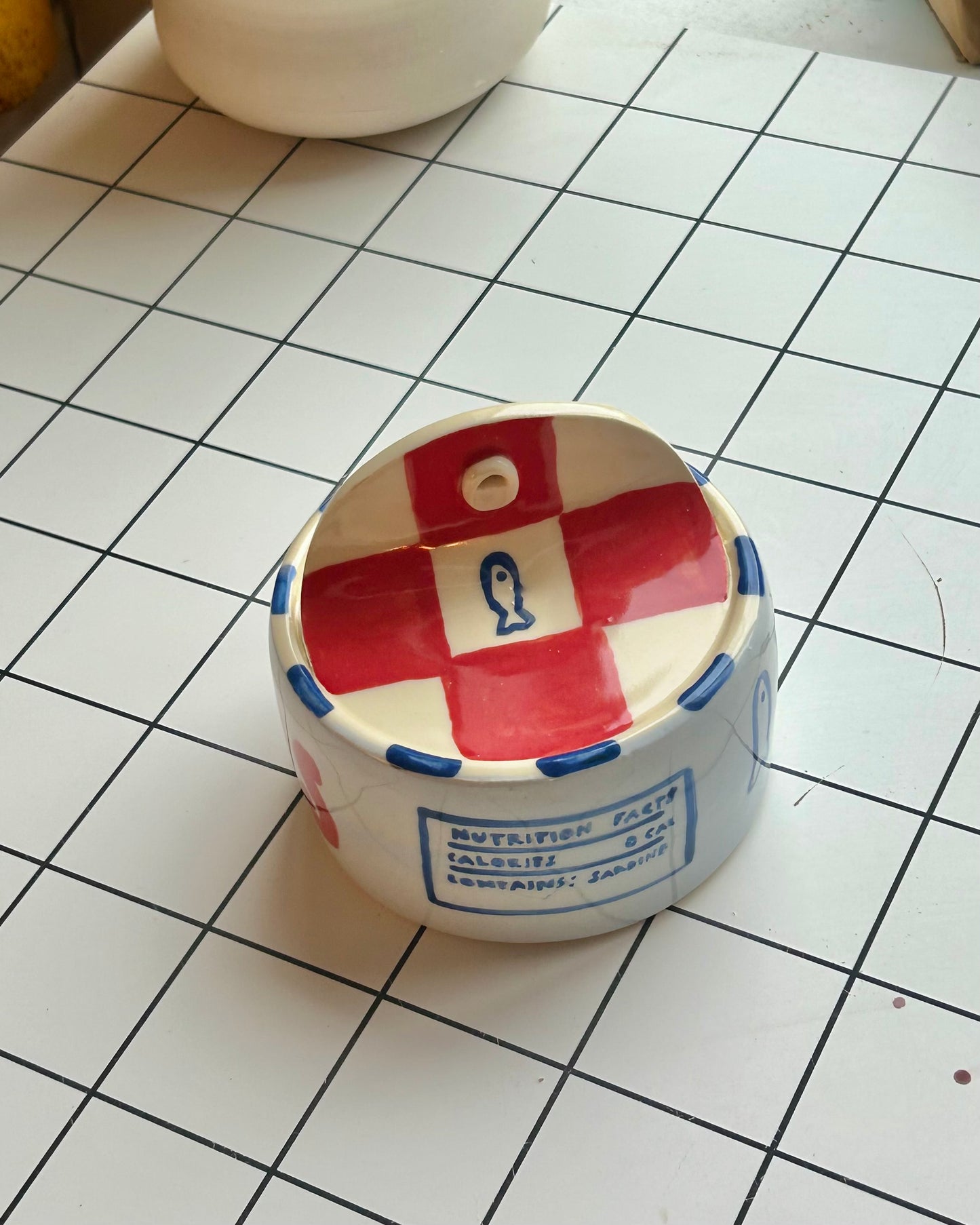 red n’ blue sardine tin + teaspoons