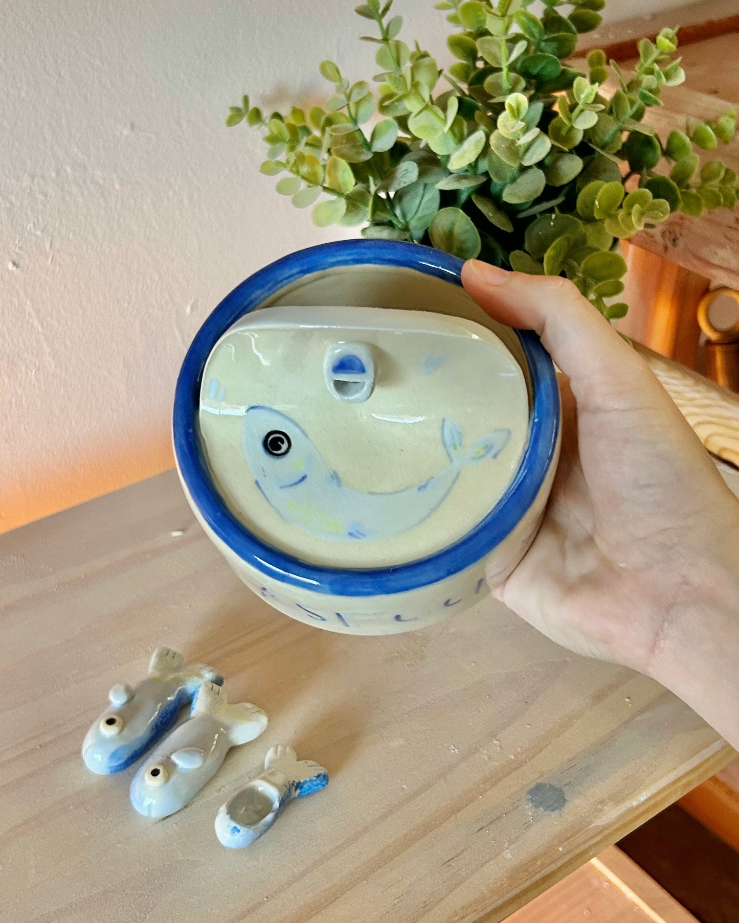 pastel sardine tin + teaspoons