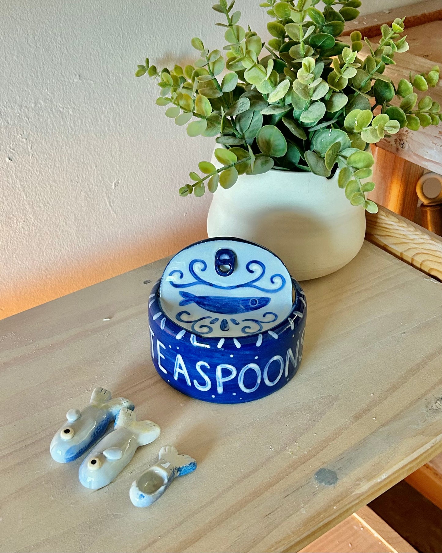 ornate sardine tin + teaspoons