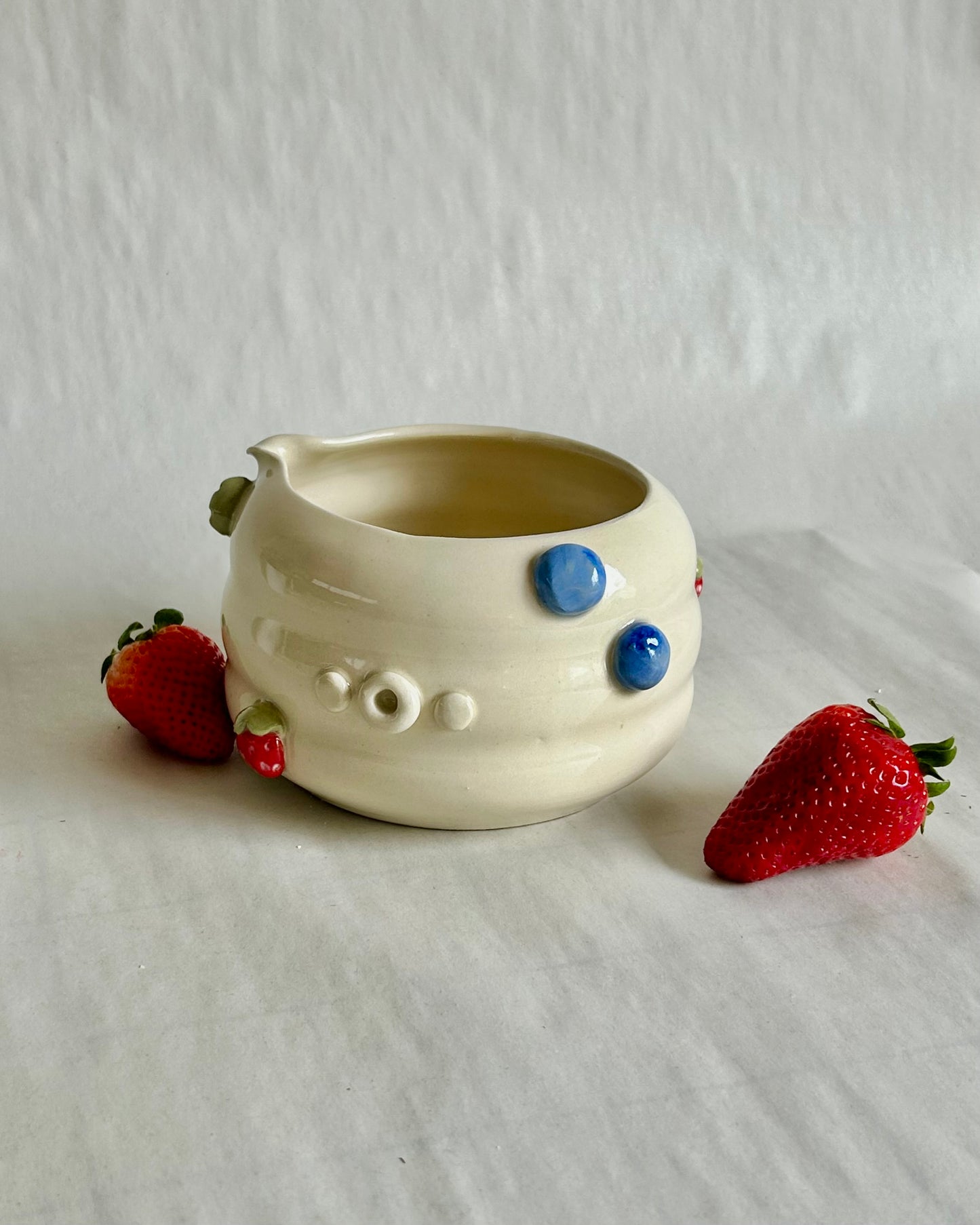 whip cream and berries matcha bowl