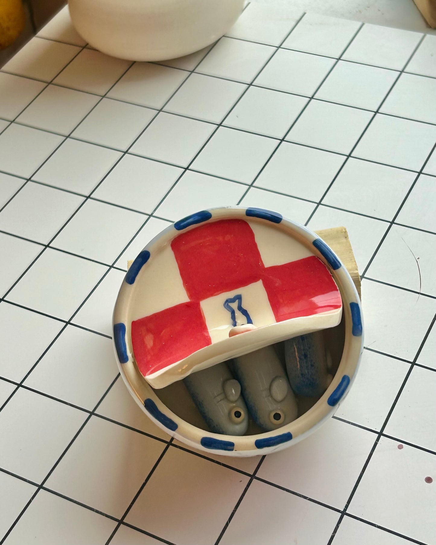 red n’ blue sardine tin + teaspoons