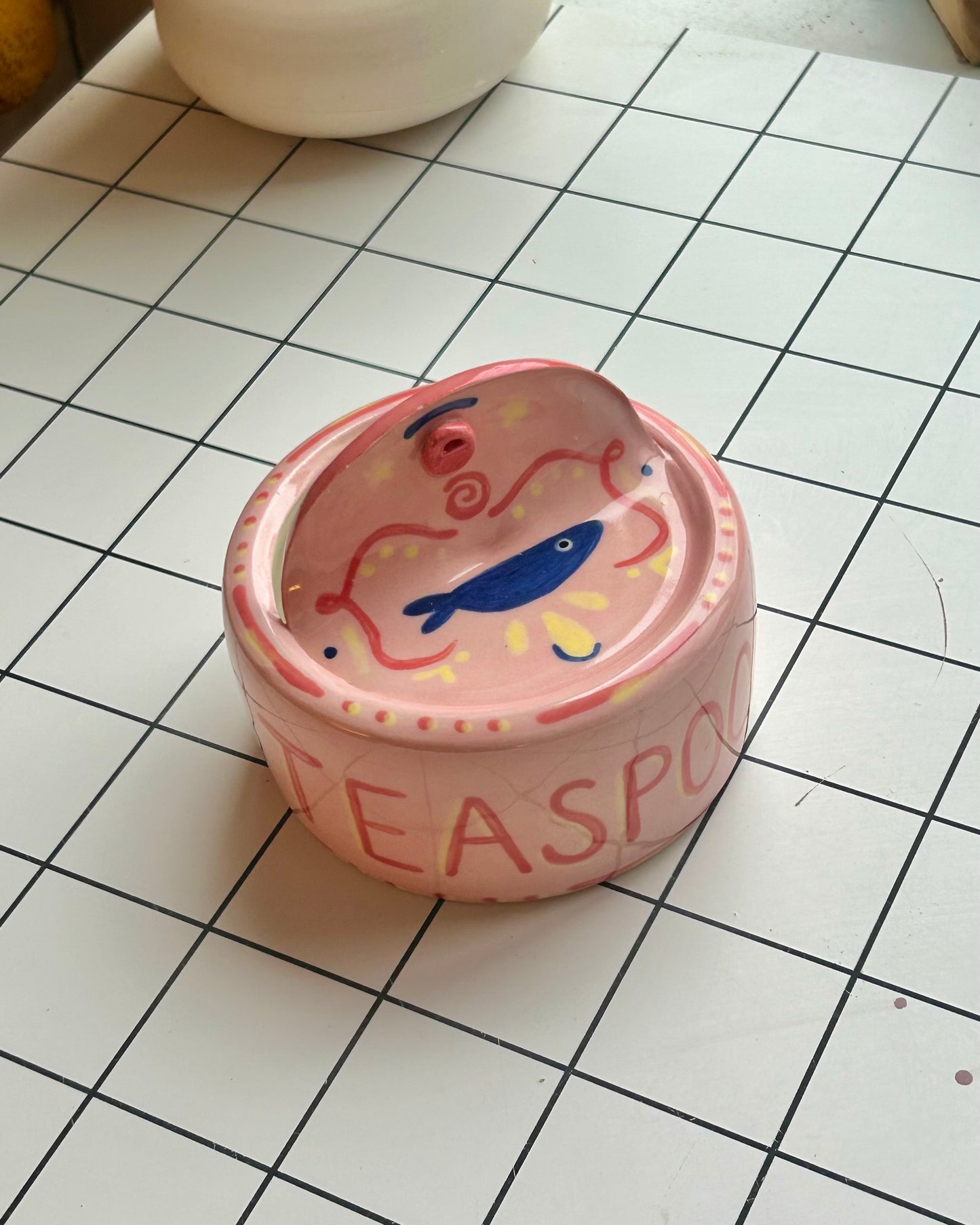 pink sardine tin + teaspoons