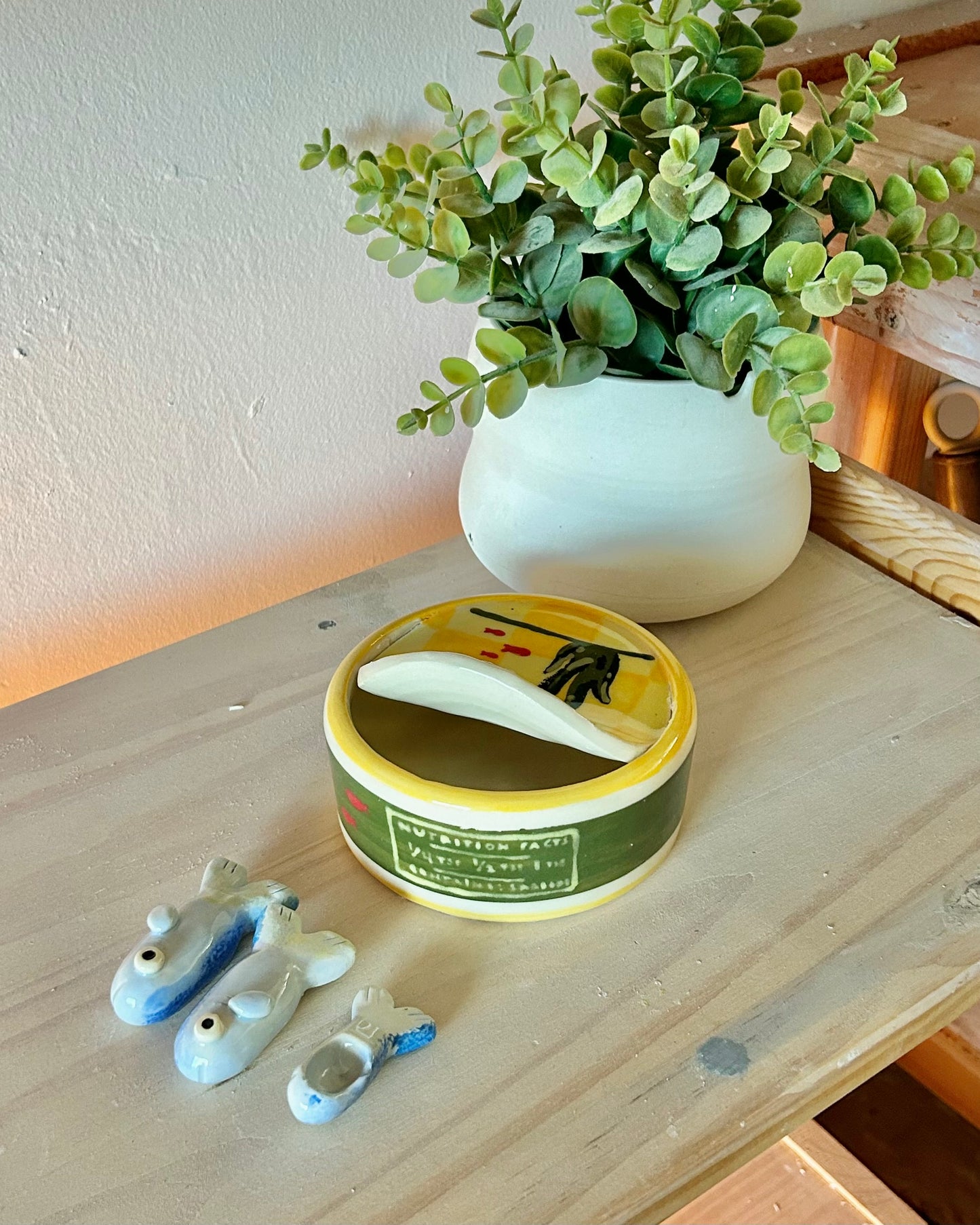 checkered sardine tin + teaspoons