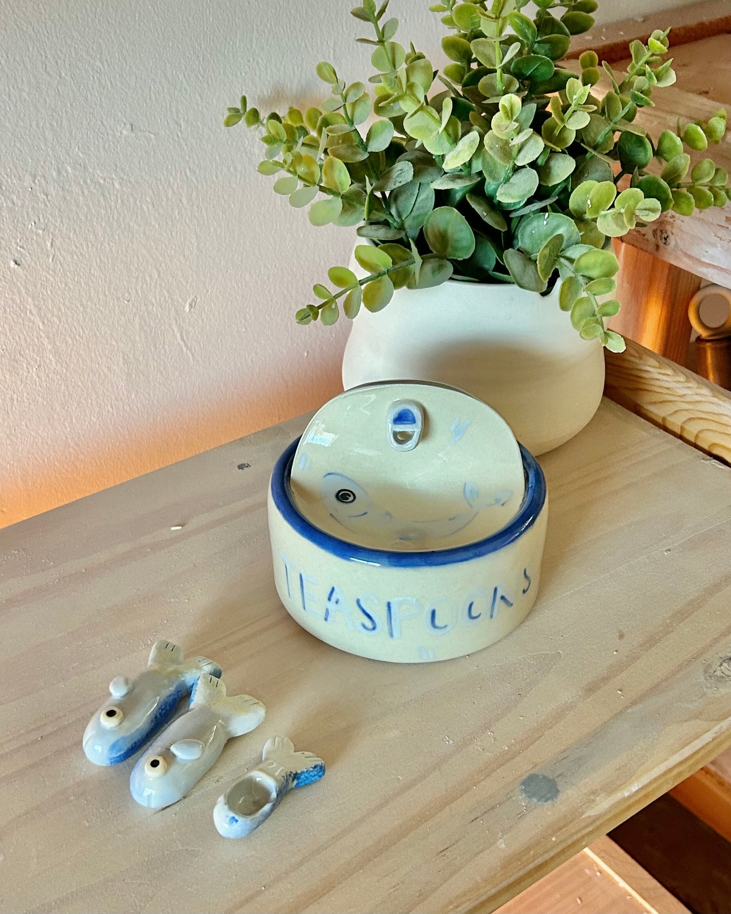 pastel sardine tin + teaspoons