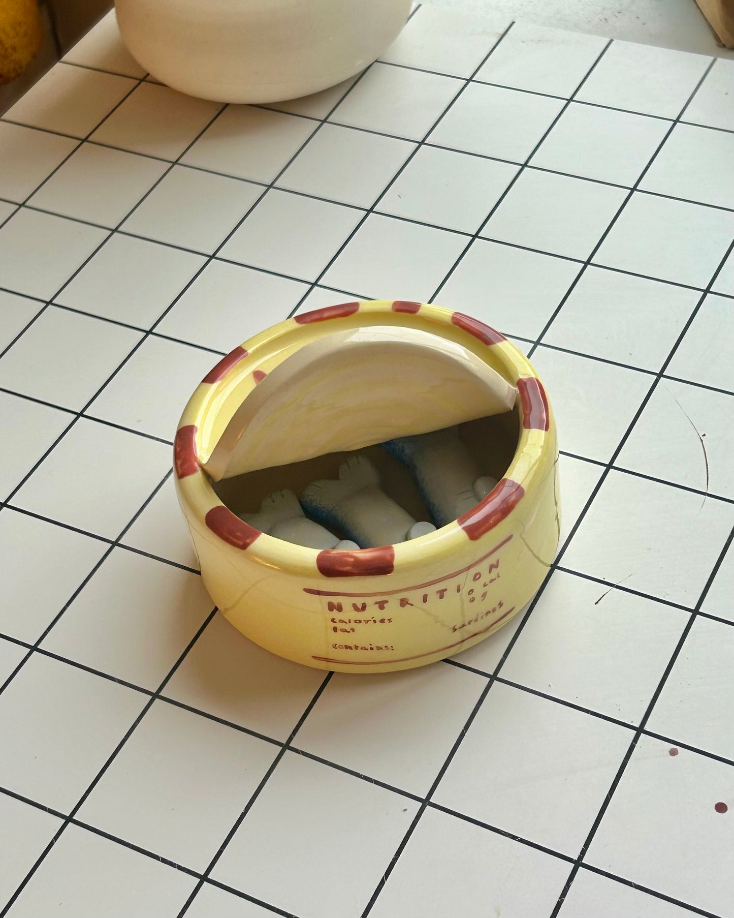 yellow n’ red sardine tin + teaspoons