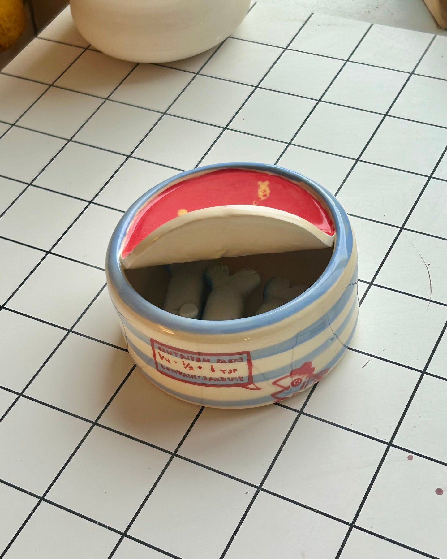 fishing pole sardine tin + teaspoons