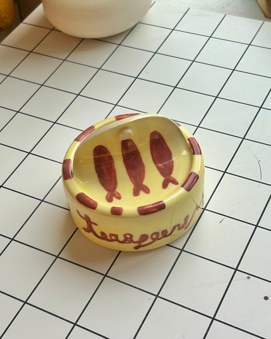 yellow n’ red sardine tin + teaspoons