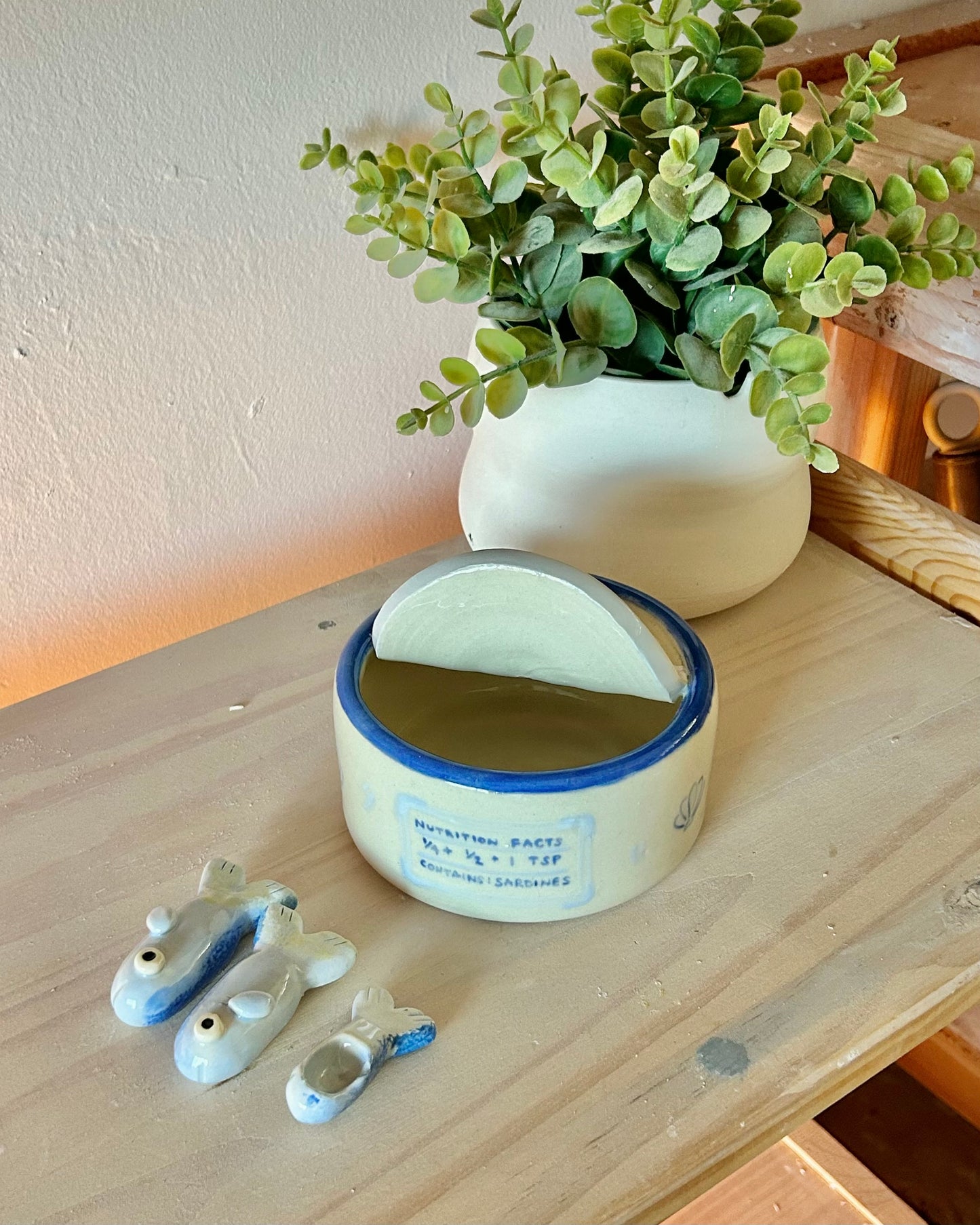 pastel sardine tin + teaspoons